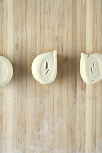 puff pastry dough cut into pieces and ready to be molded into tart tins