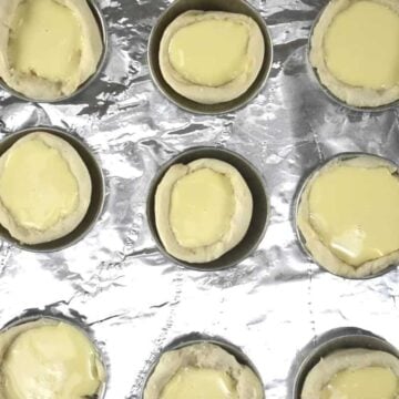 pastry cream poured into tart crusts