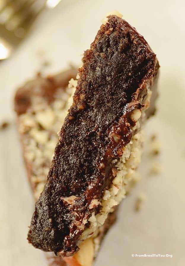 A slice of a baked dessert without flour.