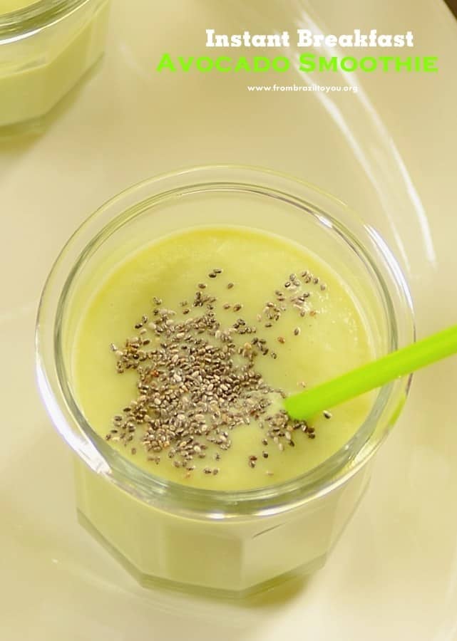A glass of Instant Breakfast Avocado Smoothie sprinkled with chia seeds