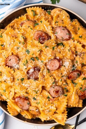 A close up of Creamy Italian Sausage Pasta in a pan.