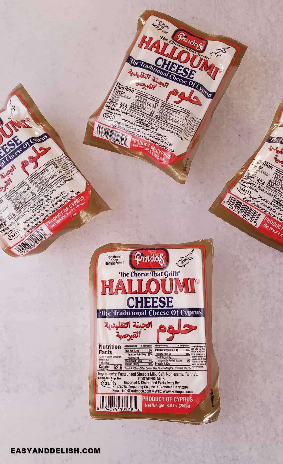 several packages of halloumi cheese ona table.