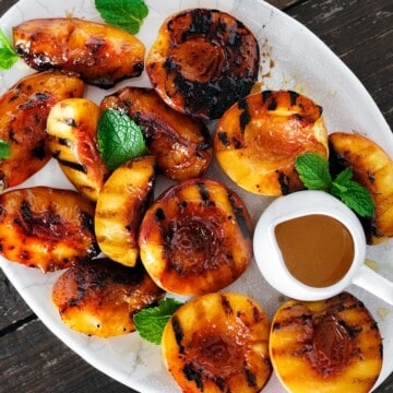 grilled peaches with honey in a platter