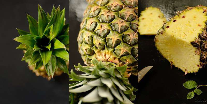 A close up of a pineapple lying on its side