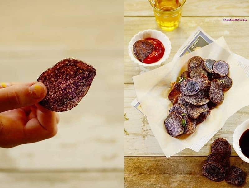 Purple potato chips held in the hand and in a basket