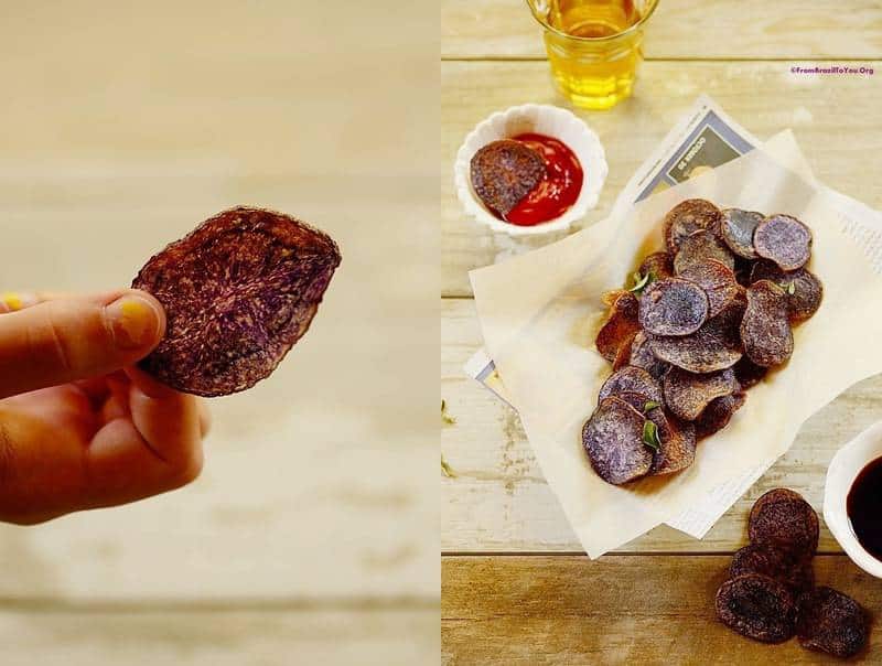 Purple potato chips held in the hand and in a basket