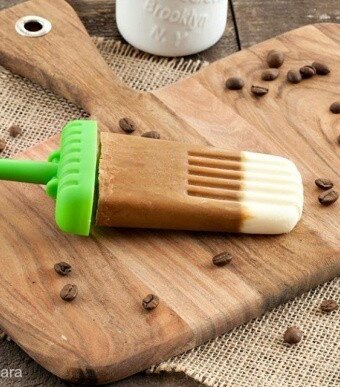 Coffee cream popsicle on a cutting board