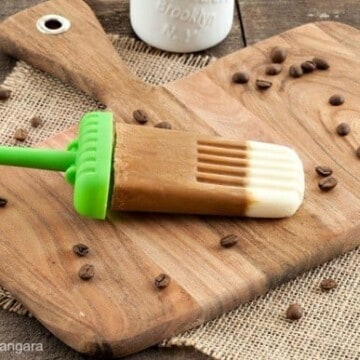 Coffee cream popsicle on a cutting board