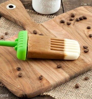 Coffee cream popsicle on a cutting board