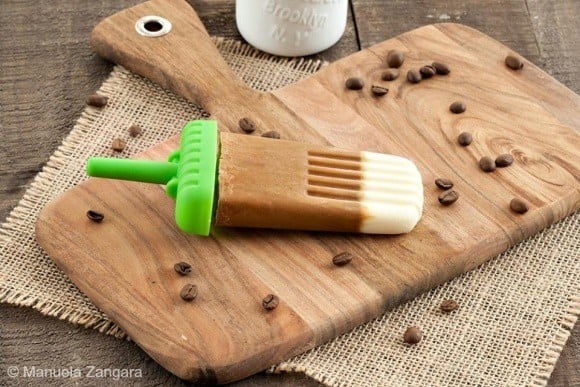 Coffee cream popsicle on a cutting board