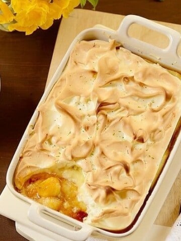 Crustless-banana-meringue-pie in a white casserole dish