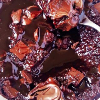 A close up of a plate covered with chocolate