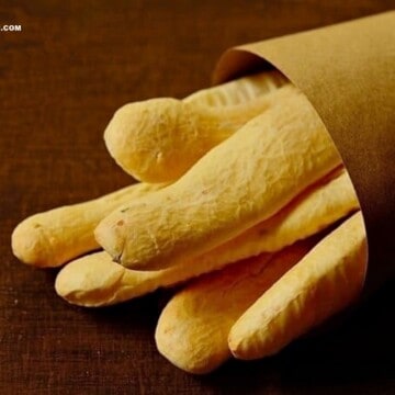 gluten-free breadsticks made with tapioca flour in a paper bag