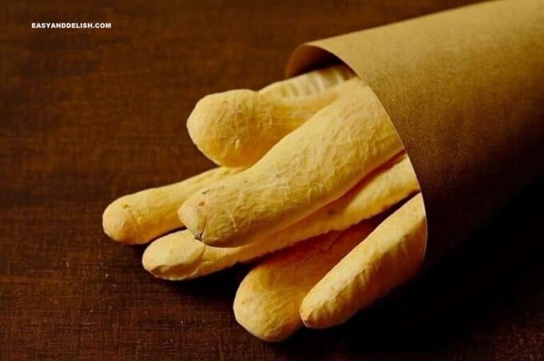 gluten-free breadsticks made with tapioca flour in a paper bag