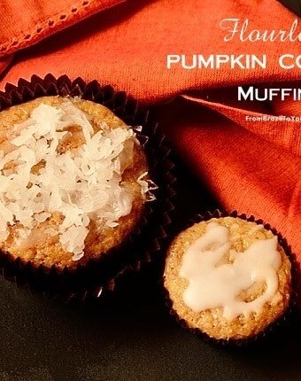 Two pumpkin coconut muffins next to an orange cloth