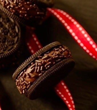 Brigadeiro cookies with a red ribbon