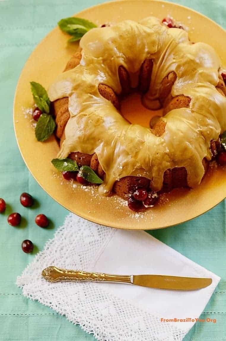 Southern bundt cake garnished with cranberries.