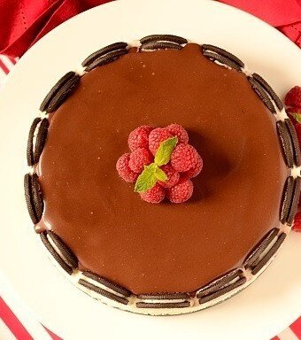 A chocolate Oreo ice cream cake on a plate