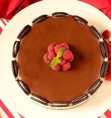 A chocolate Oreo ice cream cake on a plate