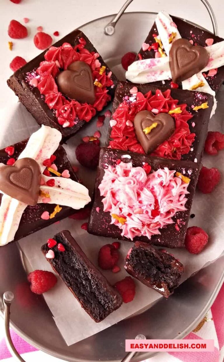 several valentine's day brownies in a platter