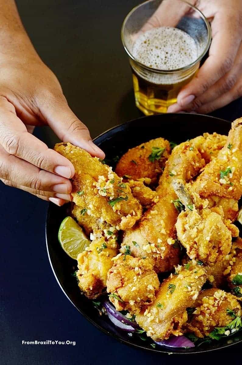 Brazilian fried chicken wings with garlic and parsley