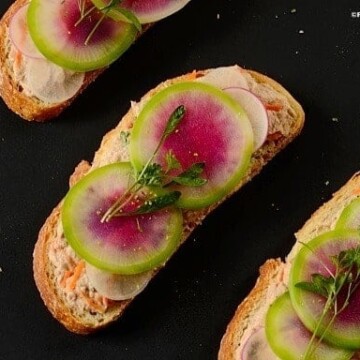 Open-faced tuna sandwiches with radish slices