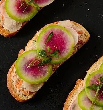 Open-faced tuna sandwiches with radish slices