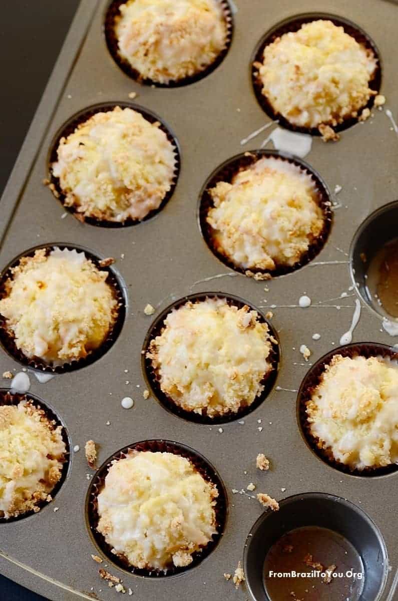 Mango Coconut Streusel Muffins in a muffin pan