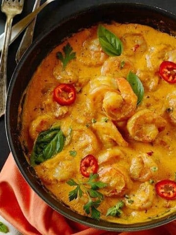 A pot of shrimp in coconut sauce