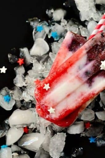 red, white, and blue popsicles with chips of ice