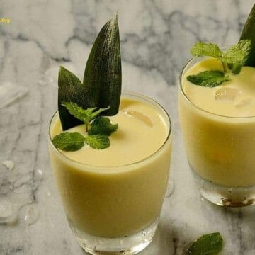 A glass of creamy pineapple coconut cocktail