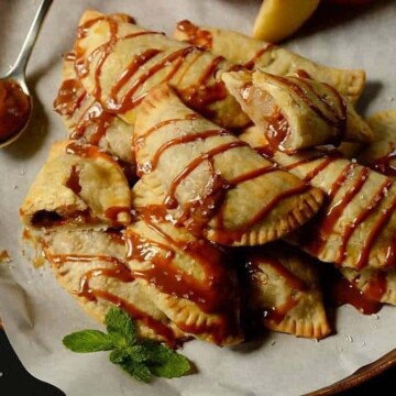 A plate of baked apple hand pies