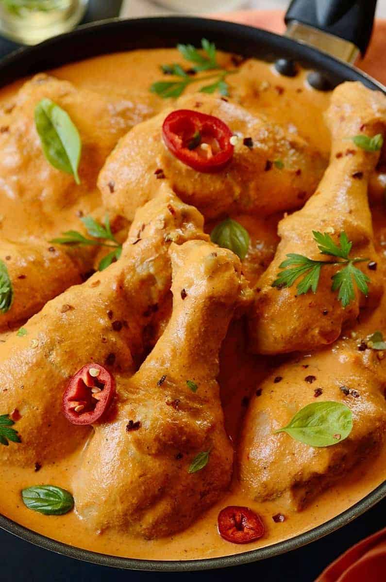 close up image of One Pot Chicken in Lime Coconut Sauce serve in a pan