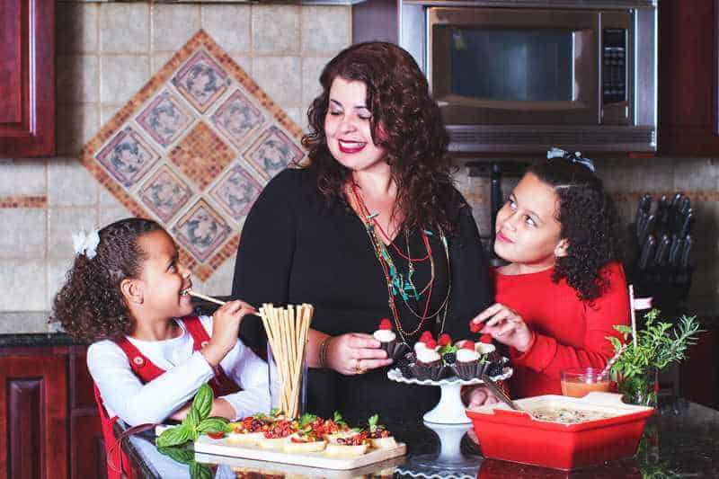 Bloh author with her kids eating in the kitchen.