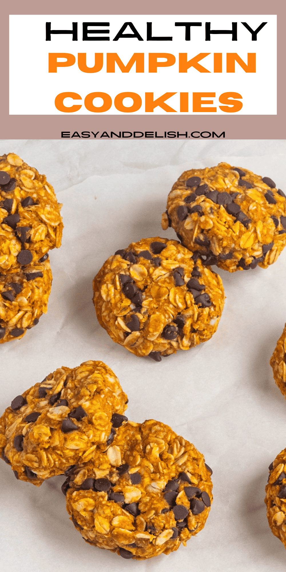 pin showing a bunch of healthy pumpkin cookies on parchment paper. 