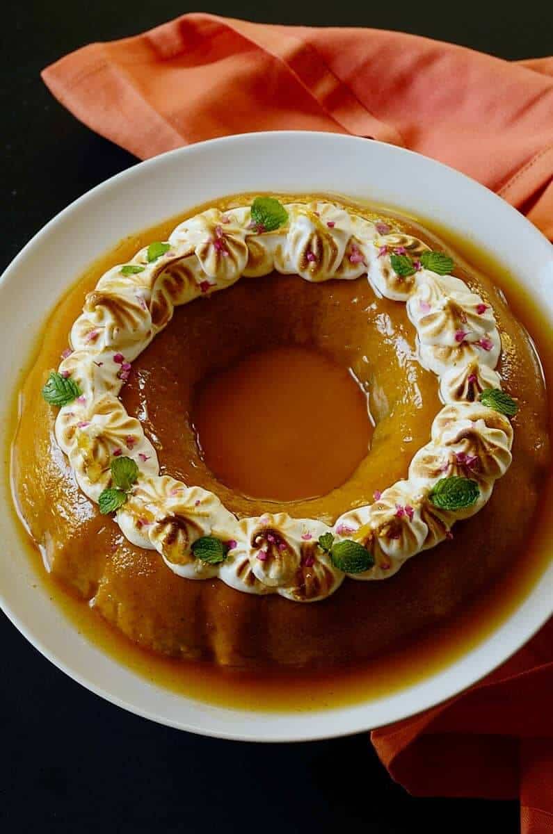 A ring of flan on a white plate