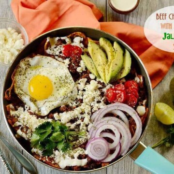 A bowl of chilaquiles on a table