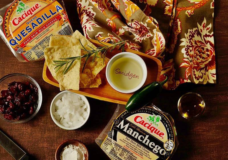 An ooey-gooey, salty-sweet and mildly spicy Cranberry Jalapeno Queso Fundido Dip to serve as an easy appetizer for the holidays. It's low carb, keto, and gluten-free! ingredients of queso fundido dip