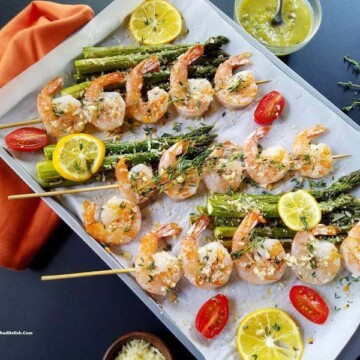 Parmesan shrimp skewers ina  baking sheet