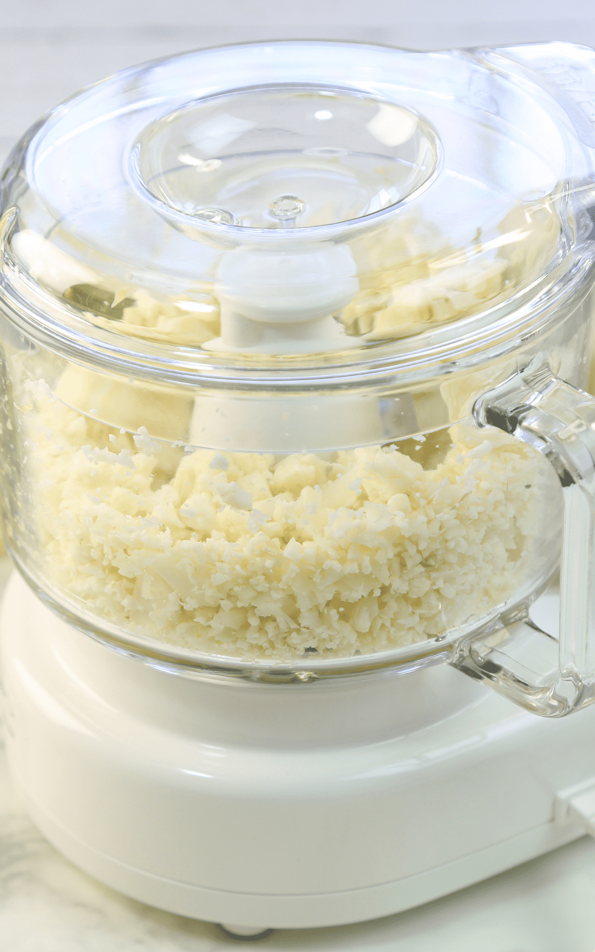 cooked cauliflower in a food processor.