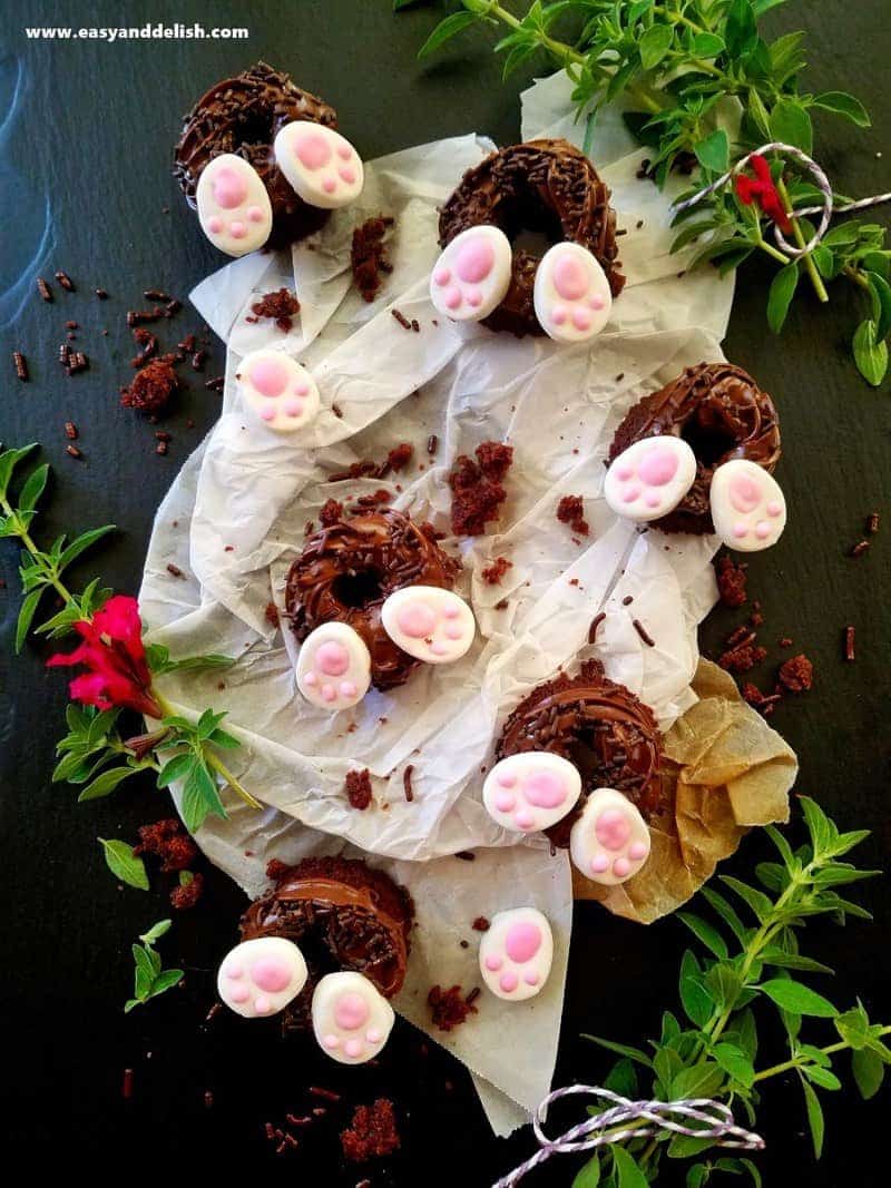 Easter cookies with rabbit paws over a table