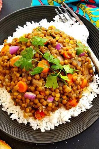 easy lentil curry served over rice in a plate
