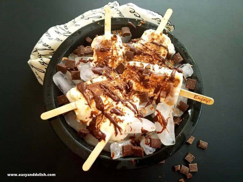 A plate of popsicles on a table