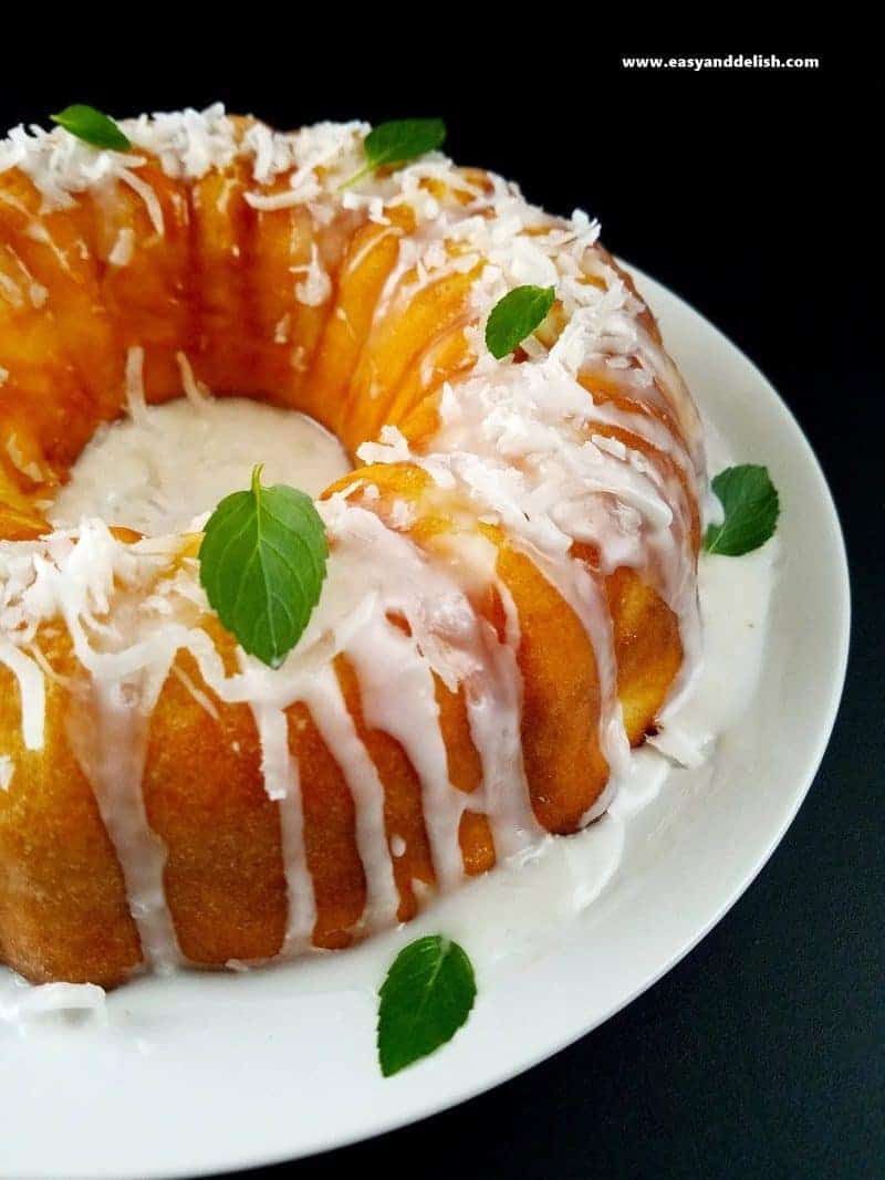 magic custard cake with a drizzle pouring from top to bottom -- close up