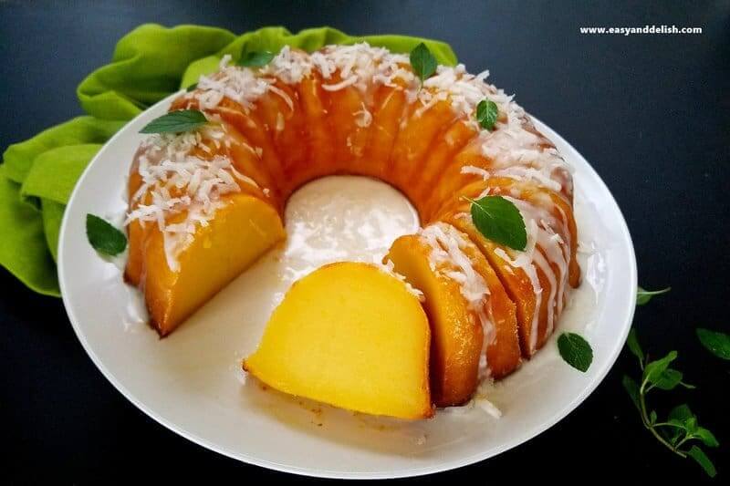 magic custard cake partially sliced in a plate