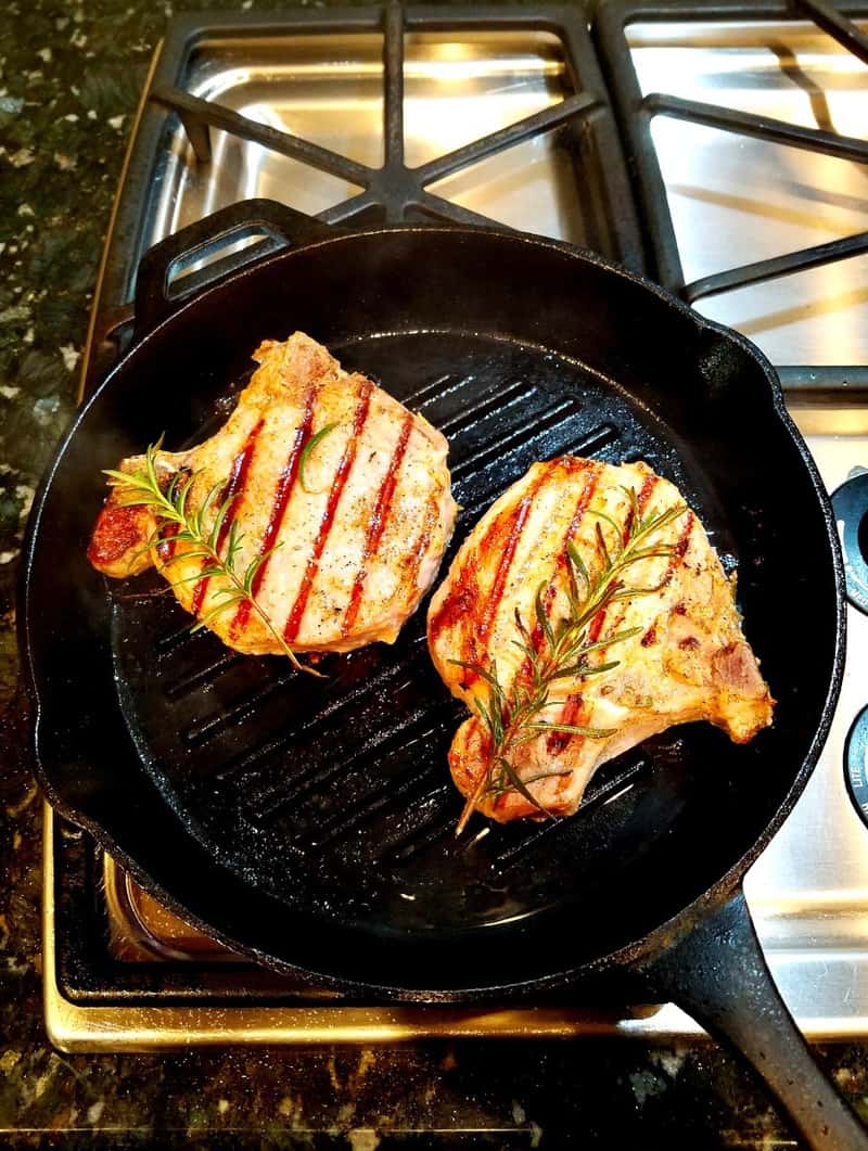 pork chops after being grilled in a pan