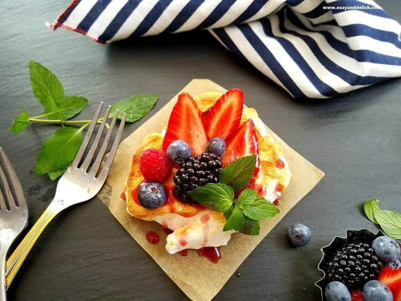 berry cloud eggs over a square of parchment paper