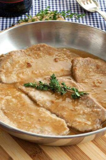 veal marsala in a skillet -- close up