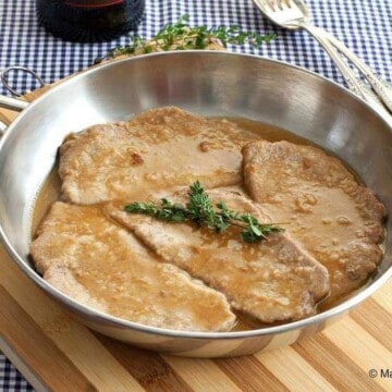 veal marsala in a skillet -- close up