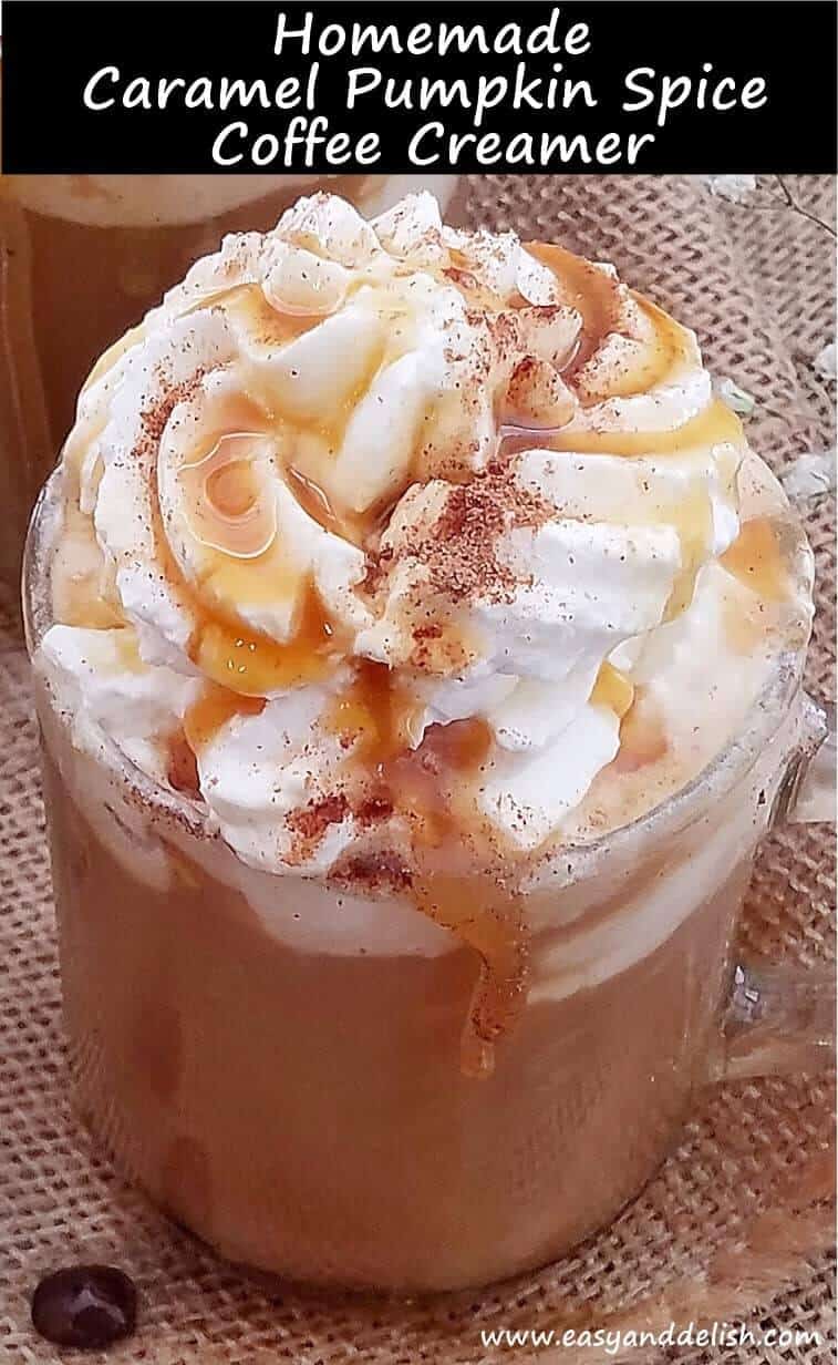 a mug with homemade coffee creamer mixed with coffee and topped with whipped cream and caramel